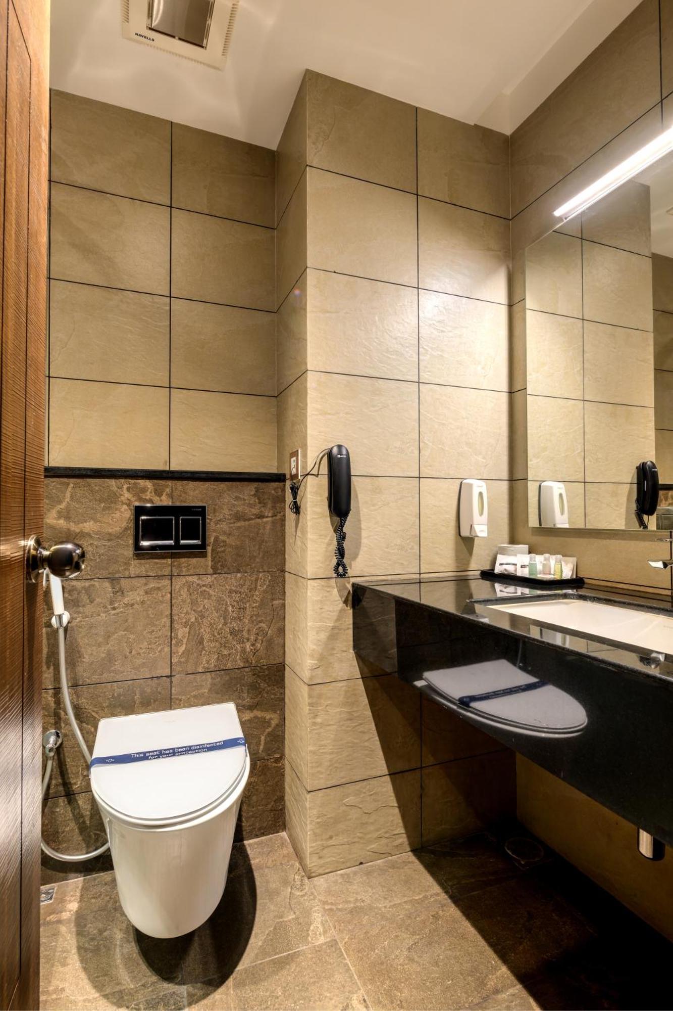 Sundex Hotel Thanjavur Bagian luar foto